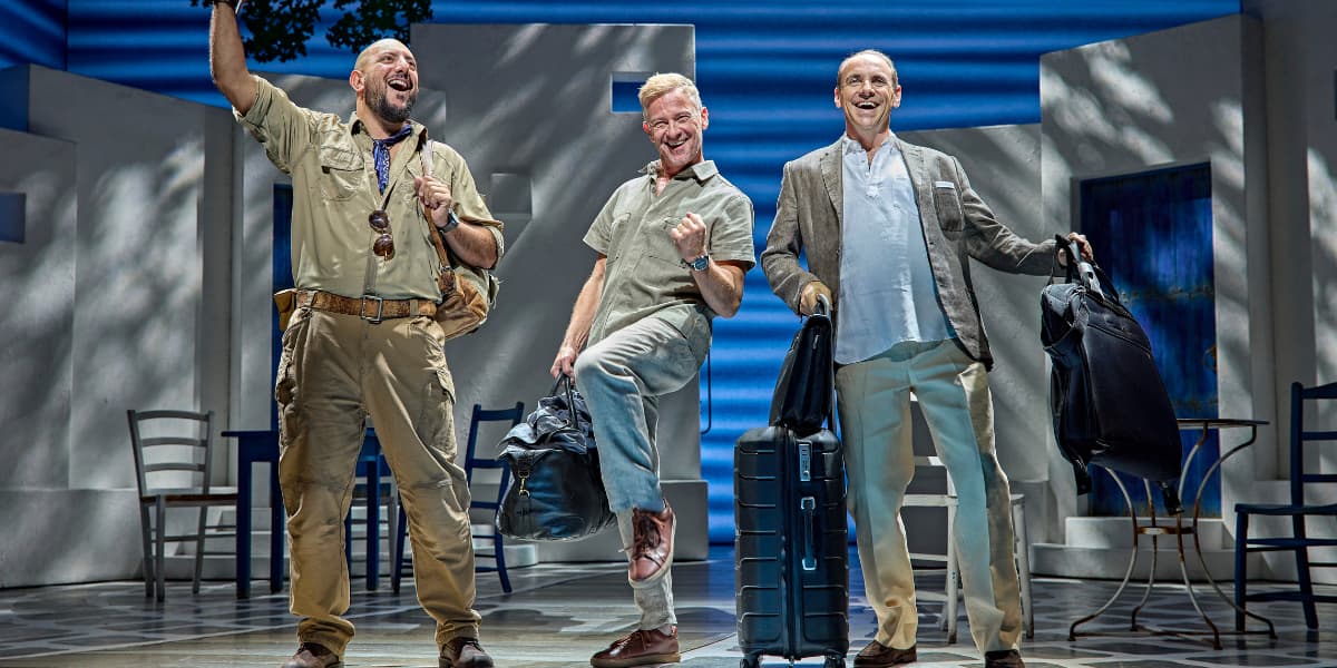 Sophie's potential dads, Harry, Sam and Bill are joking around in MAMMA MIA!