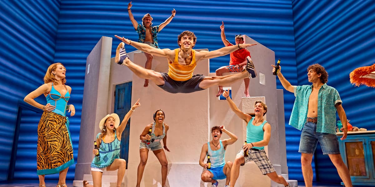 Pepper performs and impressive split jump in MAMMA MIA!