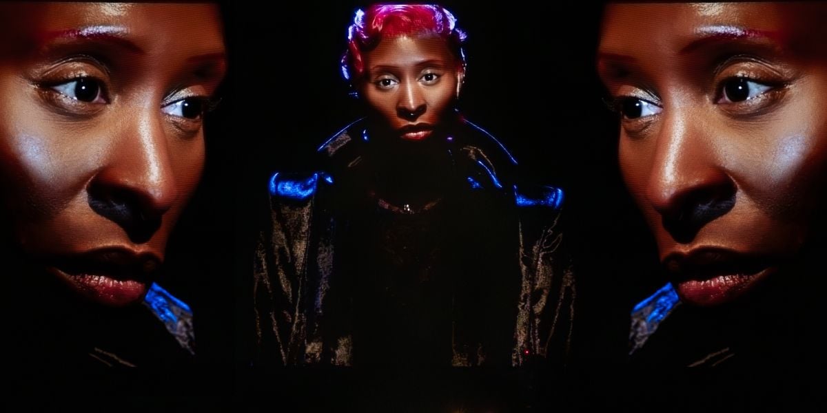 Production shots for Bram Stoker's Dracula starring Cynthia Erivo. Her face appears three times on the screen looking down on herself on stage.