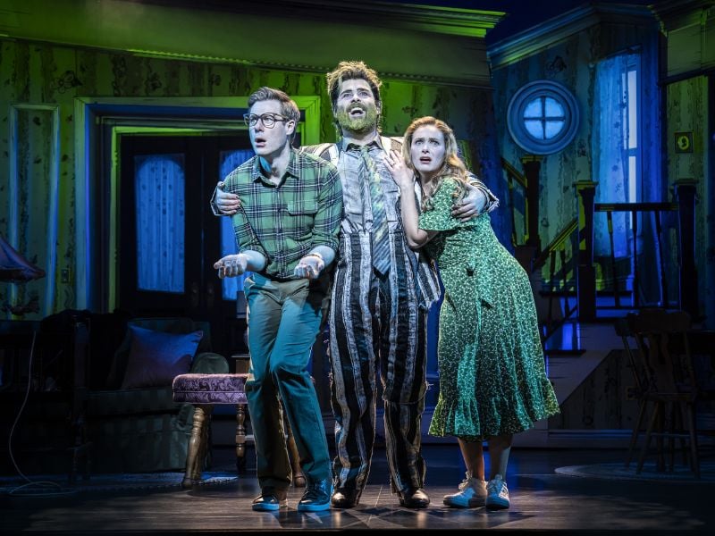 David Hunter as Adam Maitland, David Fynn as Beetlejuice and Chelsea Halfpenny as Barbara Maitland in Beetlejuice the Musical, West End © Johan Persson