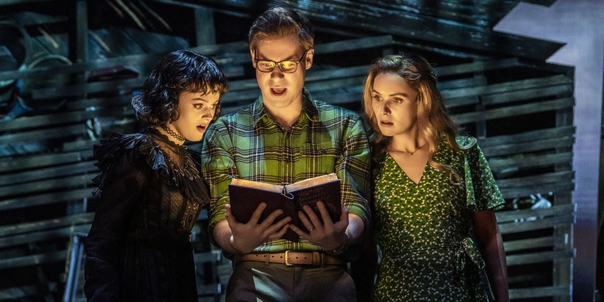 Hannah Nordberg as Lydia Deetz, David Hunter as Adam Maitland and Chelsea Halfpenny as Barbara Maitland in Beetlejuice, West End © Johan Persson