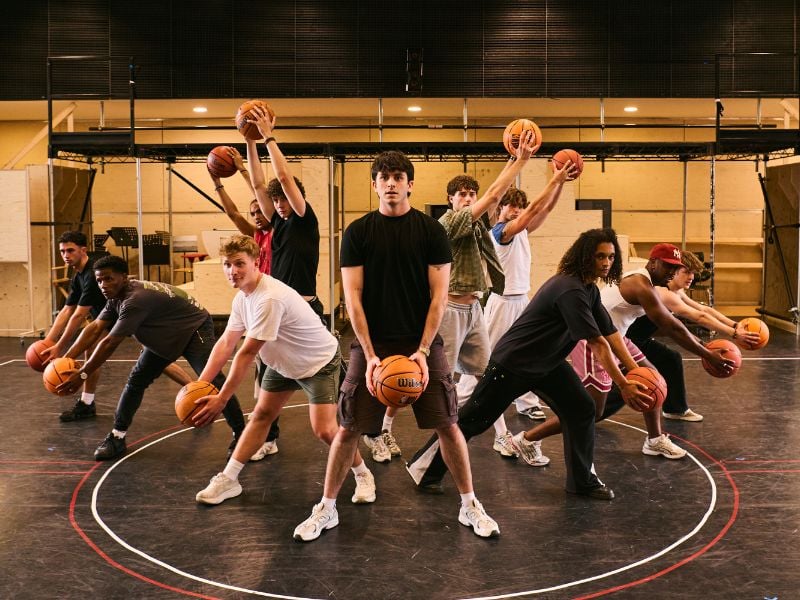 Tobias Turley (centre) & cast in rehearsals for Disney's HIGH SCHOOL MUSICAL, credit Matt Crockett